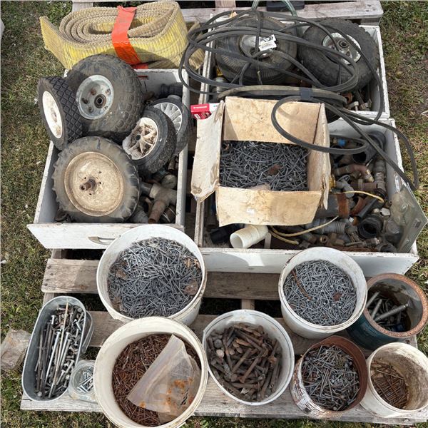 Pallet of misc utility wheels, nails, pipe fitting, bolts, tow straps