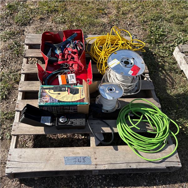 Pallet of electric wire, extension cords, outside electric timer, ratchet straps, box of marrette