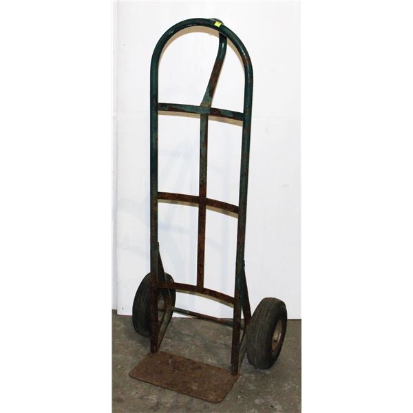 GREEN DOLLY, SOME RUST, SOLD AS IS