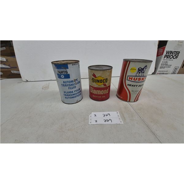 Vintage Chryco Transmission Fluid, Sunoco Diamond Motor Oil, and Husky Heavy Duty Oil Quart Cans