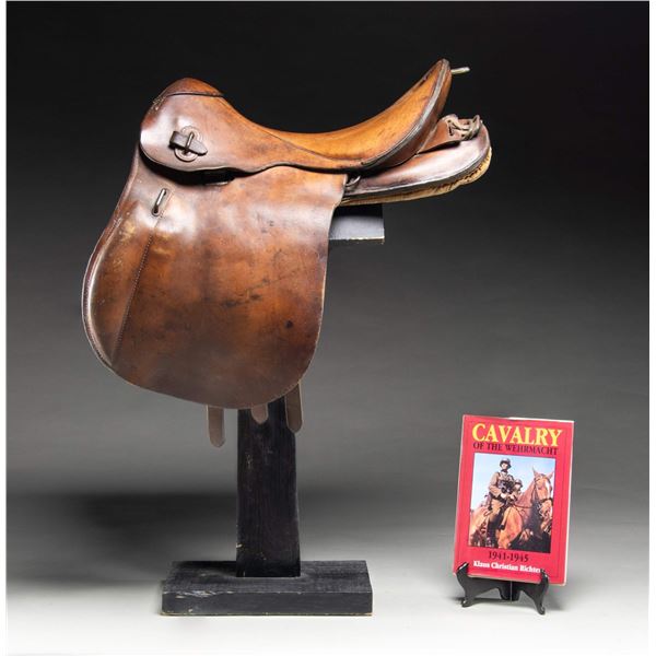 WWII GERMAN M1943 SADDLE WITH BOOK.