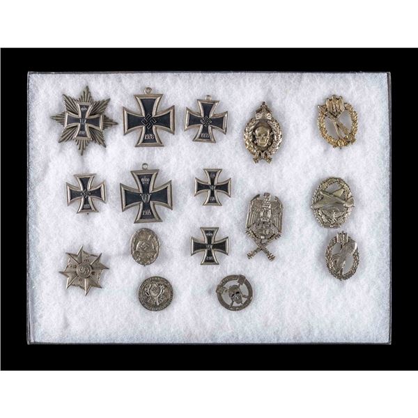 GROUP OF WWII STYLE GERMAN BADGES AND INSIGNIA.