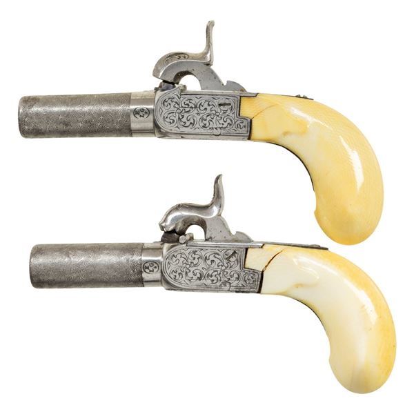 CASED PAIR OF VERY SMALL BELGIAN PERCUSSION