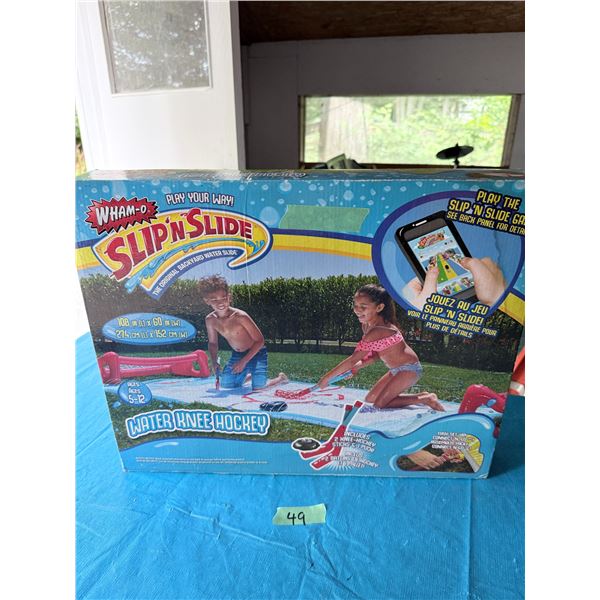 WHAM-O WATER KNEE HOCKEY SLIP N SLIDE