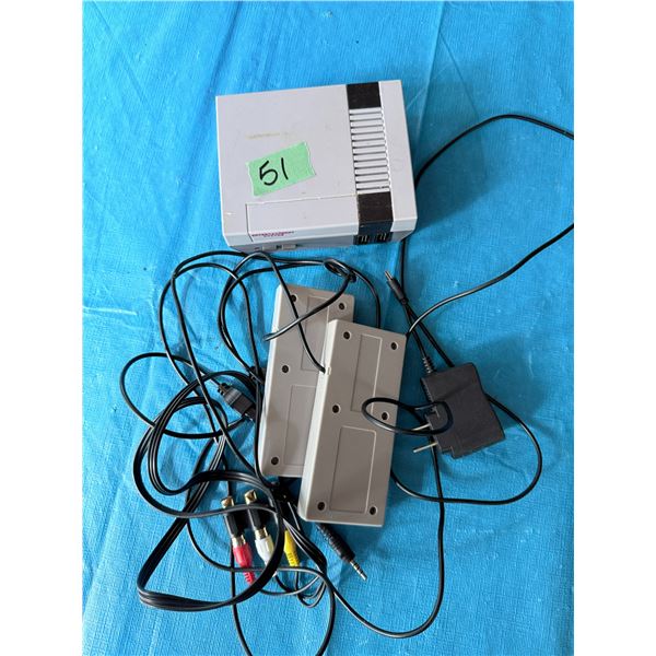 POWER ADAPTER AND AV CABLES VIDEO GAME CONSOLE