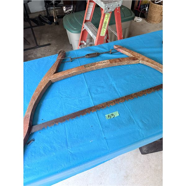 VINTAGE WOODEN-HANDLED SAW