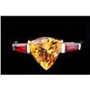 Image 1 : Charming 10K Yellow Gold Ladies Ring set with a center trilliant cut Citrine weighing approx 3.00 ca