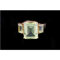 Ladies 4.5K  tw Peridot Ring set in 10kt yellow gold, melt price is $75.00. Size 7.set in 10kt yello