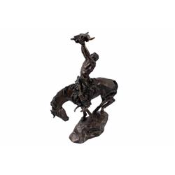Bronze Statue by McCarthy depicting an Indian on horseback. Restrike. 15 1/2"H X 7"W at base.depicti