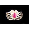 Image 1 : Ladies Pair Shaped Ruby Ring with nine side diamonds, set in 14K yellow gold, 5.8gr of gold, size 4.