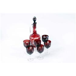 Ruby Red Cut Glass Wine Carafe with stopper and 6 matching wine glasses. Appears to be in good condi