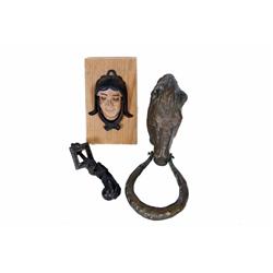 Lot of Three Antique Door Knockers A bronze horse, hand & ball, and polychromed sleepy eyed lady.A b