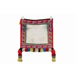 Sunday Saddle Blanket with decorative pom-poms in bright colors.with decorative pom-poms in bright c