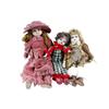 Image 1 : Collection of Three Porcelain Dolls including a 26"H Victorian style dressed doll with damage to rig