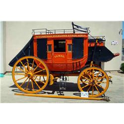 Red Concord Mail Coach made by, Frizzell Coach & Wheel Works, Oklahoma City, OK. Unknown model numbe