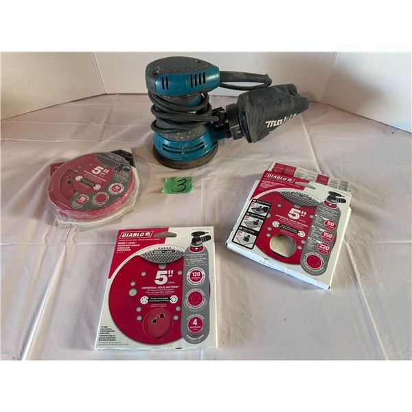 Makita 5" corded orbit sander with sanding discs
