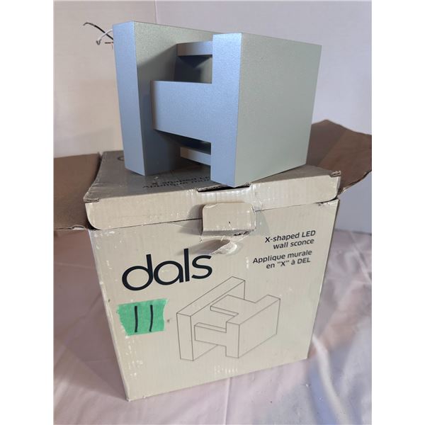 X-shaped LED wall sconce by Dals