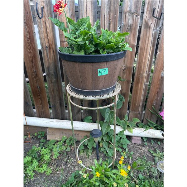 Outdoor planter with stand
