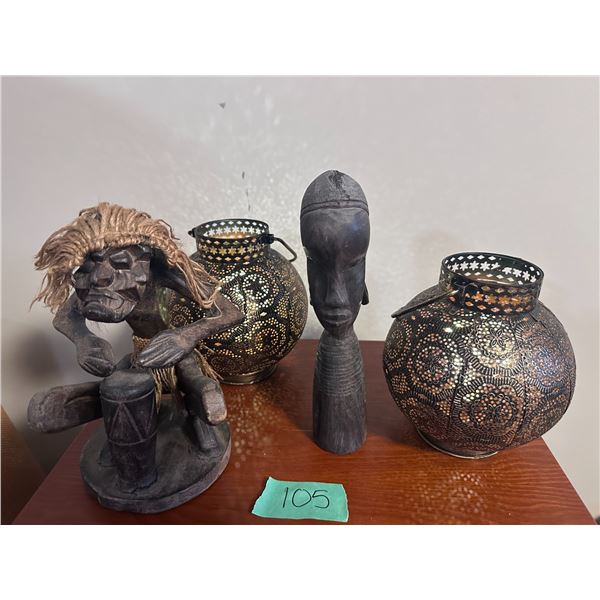 Metal lanterns and African wood ornaments