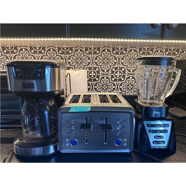 Kitchen essentials, coffee pot, toaster and Oster blender