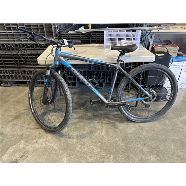 BLUE AND SILVER GIANT BIKE
