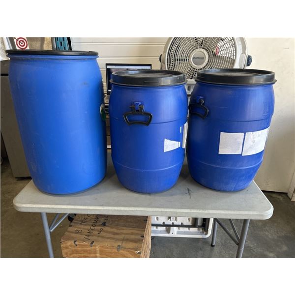 3 SMALL PLASTIC BARRELLS WITH LIDS
