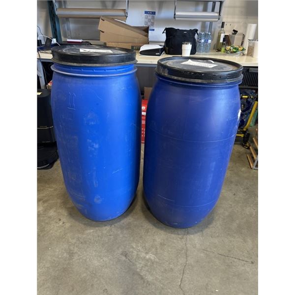 2 LARGE BLUE PLASTIC BARRELLS WITH LIDS