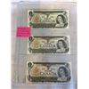 Image 1 : 3 MINT 1973 CANADIAN $1 BILLS LAST ISSUE