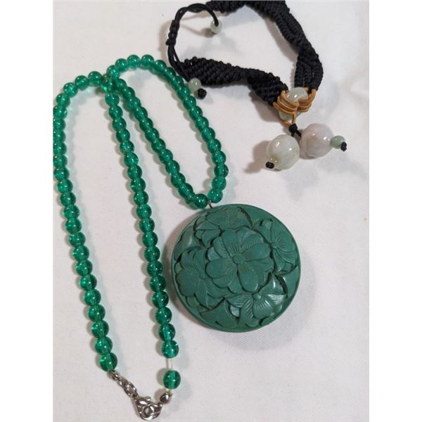 GREEN CINNEBAR PENDANT NECKLACE AND CARVED JADE BRACELET