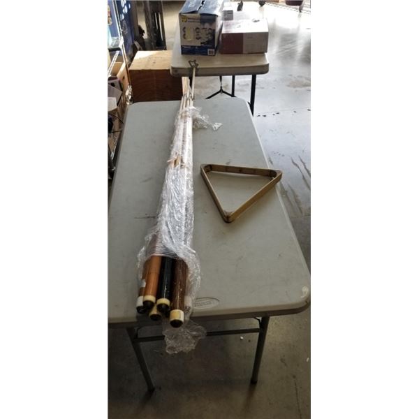 BUNDLE OF POOL CUES AND TRIANGLE