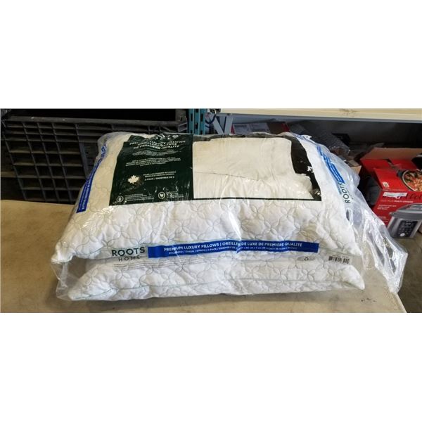 2 NEW ROOTS SLEEPING PILLOWS . QUEEN SIZE