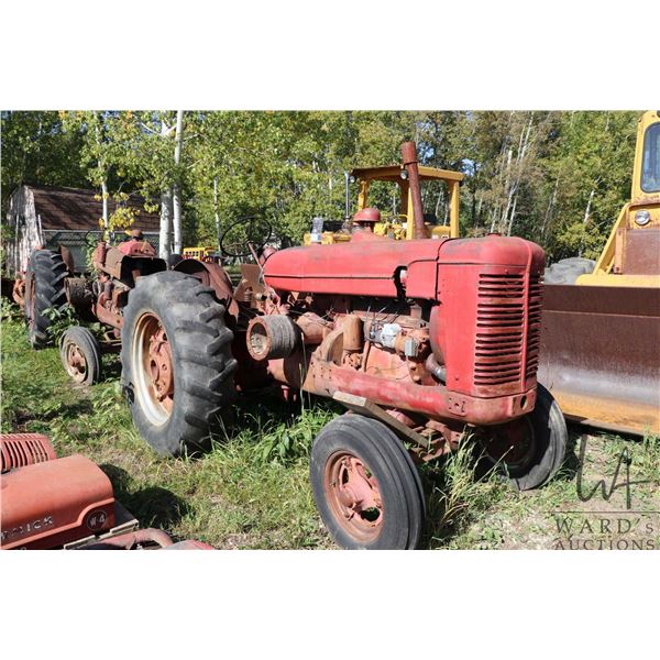 Vintage International Harvester Tractor, not in running condition, but appears mostly complete. VIN 