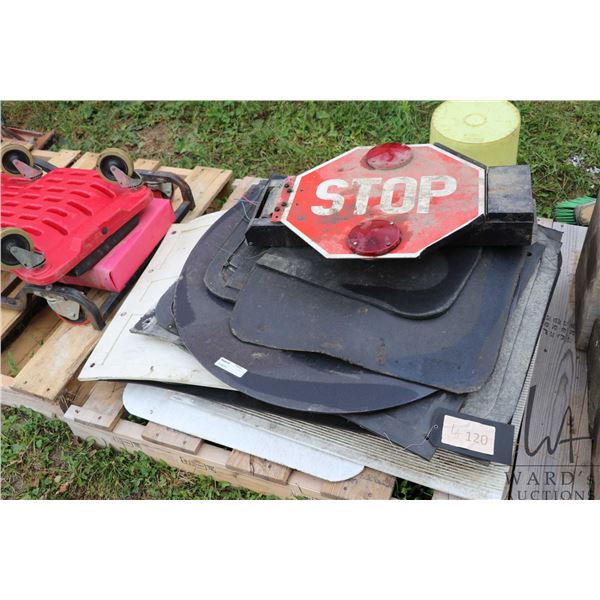 Selection of mud flaps and bus stop sign