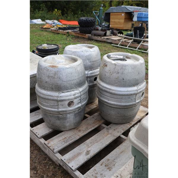 Three aluminum beer kegs