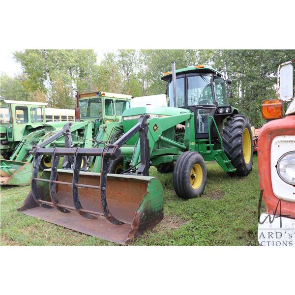 John Deere 2950 tractor with one 148 loader, fitted with grapple attached to bucket, run and operati
