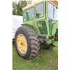 Image 10 : John Deere 4020 tractor, fitted with cab. and 158 loader with bucket. Showing 7966.7 hours. Running 