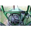 Image 23 : John Deere 4020 tractor, fitted with cab. and 158 loader with bucket. Showing 7966.7 hours. Running 