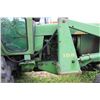 Image 7 : John Deere 4020 tractor, fitted with cab. and 158 loader with bucket. Showing 7966.7 hours. Running 