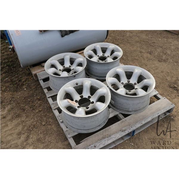 Set of four, 5 bolt mag rims, fitment unknown