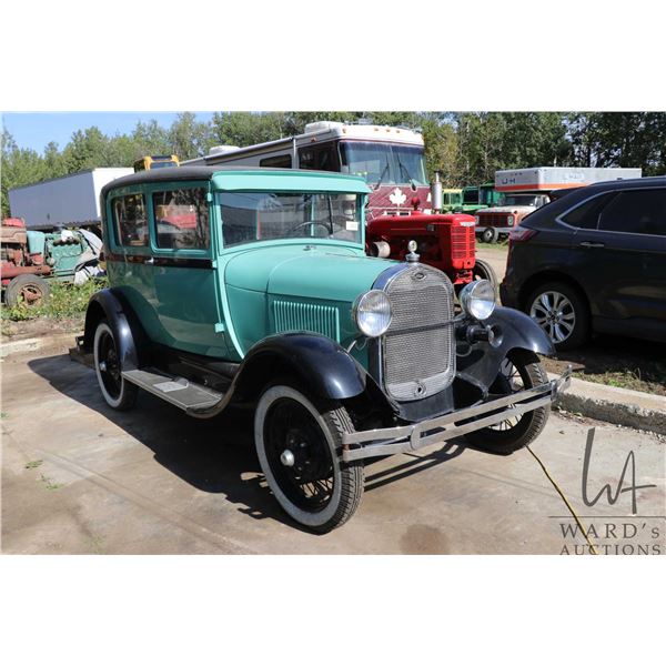 1928 Ford Model A Tudor motor car was running not long ago, however was put into storage and now nee