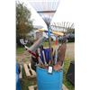 Image 2 : Rain barrel with large selection of rakes, shovels, picks etc.