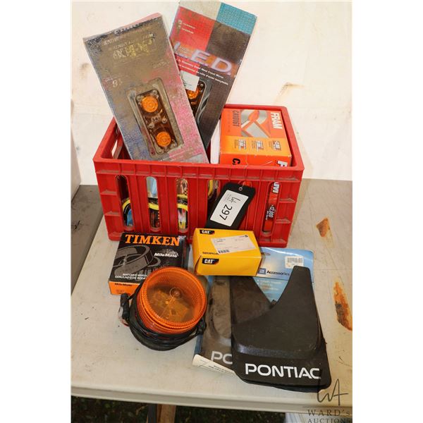 Selection of car and truck parts including Pontiac mud flaps, orange beacon and other lights, new in