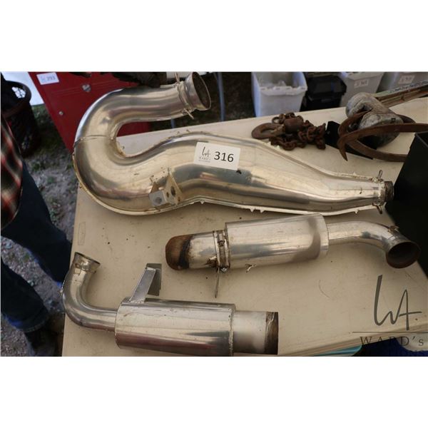 Three mufflers