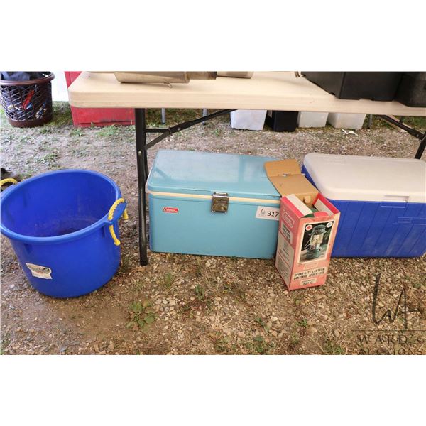 Two coolers, one vintage, one newer, a Coleman lantern and a blue tub