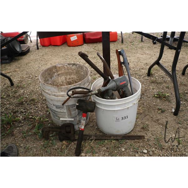 Selection of miscellaneous tools including grease gun, pipe wrench, rubber hammer, hack saw etc.