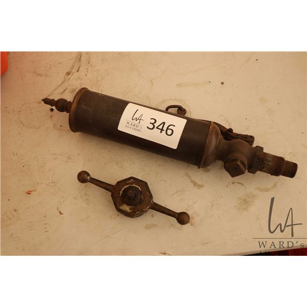Antique steam whistle and a cap for pressure vessel