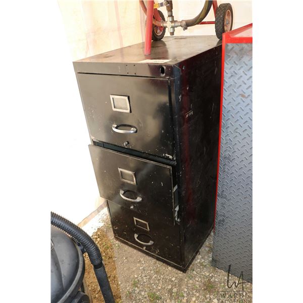 Metal filing cabinet containing pneumatic rivet gun, oil filter wrenches etc.