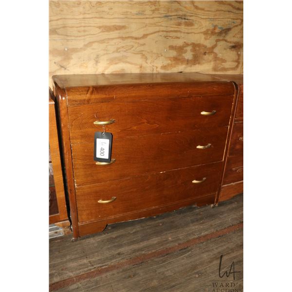 Waterfall three drawer dresser