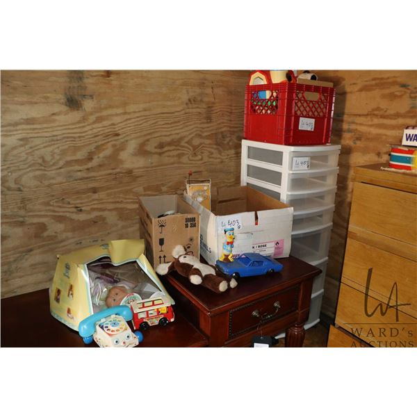 Selection of toys including Cabbage Patch and Fisher Price plus a plastic stacking drawers etc.