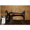 Image 2 : Antique Singer sewing machine in treadle cabinet